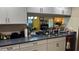 Modern kitchen with sleek countertops, ample storage, and stainless steel appliances at 2841 74Th St W # 2841, Bradenton, FL 34209