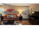 Inviting living room featuring a comfortable couch, lamps, and art at 2841 74Th St W # 2841, Bradenton, FL 34209