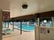 Relaxing community pool with covered seating area and clear posted rules for all residents at 2841 74Th St W # 2841, Bradenton, FL 34209