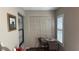 Sitting area with shuttered windows and cafe table at 2841 74Th St W # 2841, Bradenton, FL 34209
