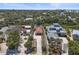 Aerial image shows waterfront property, canal, and lush surroundings in a desirable location at 30 Island Cir, Sarasota, FL 34242