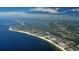 Panoramic aerial view of coastline, showcasing waterfront property, beaches, and interconnected waterways at 30 Island Cir, Sarasota, FL 34242