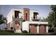 Modern two-story home featuring a two-car garage, balconies, and sleek architectural design at 30 Island Cir, Sarasota, FL 34242
