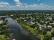 Beautiful aerial view showcasing waterfront homes along a scenic river at 301 W South Ave, Tampa, FL 33603