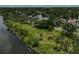 Scenic aerial view highlighting a spacious park along the riverfront at 301 W South Ave, Tampa, FL 33603