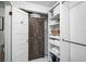 Closet with ample storage, shelving, and built-in organizers for linens and other items at 301 W South Ave, Tampa, FL 33603
