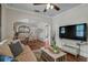 Inviting living room with hardwood floors, neutral colors, and an open layout at 301 W South Ave, Tampa, FL 33603