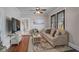 Comfortable living room with hardwood floors, stylish decor, and ample natural light at 301 W South Ave, Tampa, FL 33603