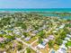 Breathtaking aerial view of the neighborhood with ocean access and nearby attractions at 302 Pavonia Rd, Nokomis, FL 34275