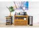Functional kitchen with an appliance station, offering a microwave, dishware, and storage at 302 Pavonia Rd, Nokomis, FL 34275