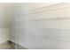 Walk in closet showcasing ample storage with white metal racks at 305 Via Tuscany Ave, Sarasota, FL 34243