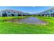 Townhomes with a lake view, offering a serene and picturesque setting for residents to enjoy at 305 Via Tuscany Ave, Sarasota, FL 34243