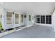 Spacious carport area with ample space for parking and features a covered entrance to the home at 3214 Sycamore Ter, Sarasota, FL 34237
