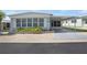 Charming single-story home with a covered carport and manicured landscaping in a quiet neighborhood at 3214 Sycamore Ter, Sarasota, FL 34237
