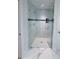 Modern shower with black and white tiling and clear glass enclosure at 3386 Irma St, North Port, FL 34291