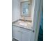 Bathroom showcasing vanity with a modern mirror and a marble countertop at 3398 Escobar Ln, North Port, FL 34286