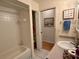 Bathroom with tub and shower combination, tile floors, and a vanity with plenty of storage space at 3828 6Th W Ave, Palmetto, FL 34221