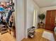 Walk-in closet with organized storage, shoe rack, and a glimpse into an adjacent room at 3828 6Th W Ave, Palmetto, FL 34221