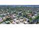 Aerial shot of a waterfront neighborhood featuring stunning homes on the canal at 385 Avenida Madera, Sarasota, FL 34242