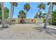 Charming home featuring a well-maintained exterior, manicured landscaping, and a welcoming front entrance at 385 Avenida Madera, Sarasota, FL 34242