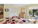 Inviting bedroom with closet space, and a window offering a peaceful view at 4109 Carriage Dr # 23, Sarasota, FL 34241