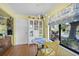 Cozy breakfast nook with a marble table, tiled floor, and a large window at 4109 Carriage Dr # 23, Sarasota, FL 34241