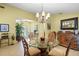 Dining area features tile flooring and natural light at 4109 Carriage Dr # 23, Sarasota, FL 34241