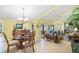 Dining and living rooms are open and well-lit with tile flooring and natural light at 4109 Carriage Dr # 23, Sarasota, FL 34241
