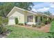 Attractive single-story home with lush landscaping around the home at 4109 Carriage Dr # 23, Sarasota, FL 34241