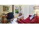 Cozy living room with closet space, comfortable seating and plenty of natural light at 4109 Carriage Dr # 23, Sarasota, FL 34241