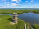 Picturesque aerial view of a tower overlooking serene waters and lush vegetation at 4204 Overture Cir # 4204, Bradenton, FL 34209