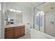 This bathroom features a glass-enclosed shower, modern fixtures, and neutral tile flooring at 4204 Overture Cir # 4204, Bradenton, FL 34209