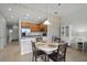 Cozy dining room area next to kitchen, featuring a round table with seating for four at 4204 Overture Cir # 4204, Bradenton, FL 34209