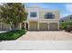 Three-unit townhouse building featuring tan stucco and a brick driveway at 4204 Overture Cir # 4204, Bradenton, FL 34209
