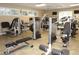 Community gym featuring modern exercise equipment, tiled floors, and bright overhead lighting at 4204 Overture Cir # 4204, Bradenton, FL 34209