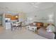 Open floor plan featuring tile floors, light-blue walls, and kitchen and living room combo at 4204 Overture Cir # 4204, Bradenton, FL 34209