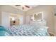 Spacious bedroom with closet, dresser and connecting door at 4220 Miriana Way, Sarasota, FL 34233