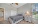 Neutral bedroom featuring closet and side table at 4220 Miriana Way, Sarasota, FL 34233