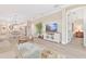 Open floor plan with living room flowing into the dining area and kitchen for a seamless living experience at 42250 Ramble Rd, Punta Gorda, FL 33982