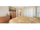 Cozy bedroom with carpet flooring and a decorative bedspread at 4308 Kingston Loop, Sarasota, FL 34238
