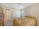 Comfortable bedroom with carpet flooring and a ceiling fan at 4308 Kingston Loop, Sarasota, FL 34238