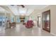 Inviting living room features tiled floors, a fireplace, and a relaxing seating area at 4308 Kingston Loop, Sarasota, FL 34238