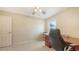 Functional office space with natural light, ceramic tile floors and a ceiling fan for added comfort at 4308 Kingston Loop, Sarasota, FL 34238