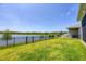 The backyard boasts a beautiful view of the lake and forest at 4524 Pippin Ln, Lakewood Ranch, FL 34211