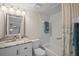Cozy bathroom with shower and tub combination featuring a neutral granite countertop at 4530 Pinebrook Cir # 109, Bradenton, FL 34209