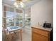 Cozy breakfast nook with table, chairs and natural light at 4530 Pinebrook Cir # 109, Bradenton, FL 34209