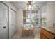 Bright breakfast nook featuring large windows and a view of the outdoors at 4530 Pinebrook Cir # 109, Bradenton, FL 34209