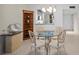 Bright dining area features views into the kitchen and is conveniently located near the living spaces at 4530 Pinebrook Cir # 109, Bradenton, FL 34209