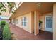 Covered front entrance with seating area at 4530 Pinebrook Cir # 109, Bradenton, FL 34209