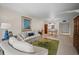 Inviting living room with comfortable seating and an open floor plan at 4530 Pinebrook Cir # 109, Bradenton, FL 34209